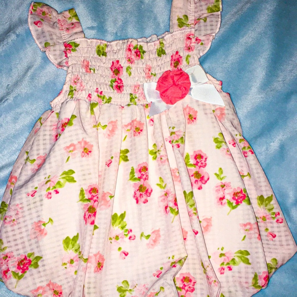Little girls dress, it’s white, pink, and green